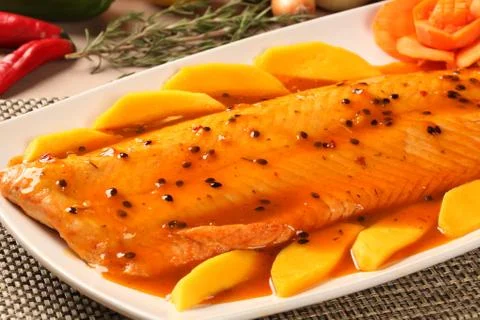 Salmon with passion fruit. Stock Photos