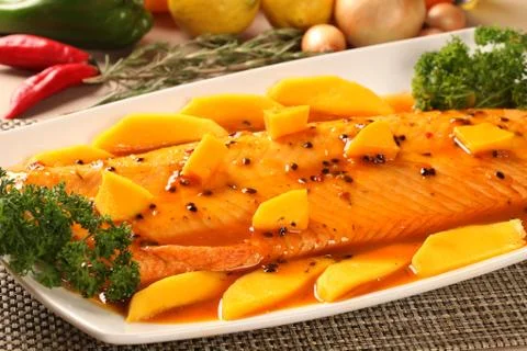Salmon with passion fruit. Stock Photos