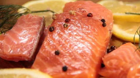 Salmon raw lemon Stock Footage 76989027