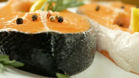 Salmon. Raw Trout Red Fish Steak with Herbs and Lemon. Cooking Salmon, sea food. Stock Footage 97796898
