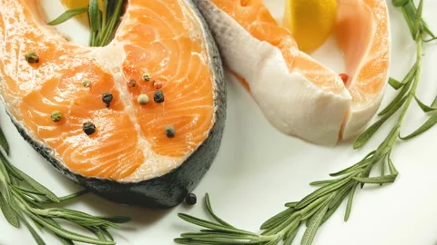 Salmon. Raw Trout Red Fish Steak with Herbs and Lemon. Cooking Salmon, sea food. Stock Footage 97798140