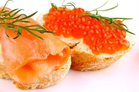 Salmon red caviar on bread with dill Foto stock