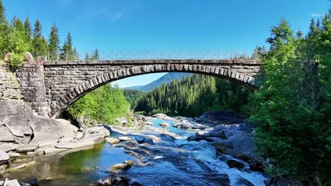 Salmon River Stone Bridge in Korgen, Norway Drone Aerial Video Fly Under 4K Stock Footage 286956080