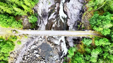 Salmon River Stone Bridge in Korgen, Norway, Drone Aerial Video Fly Over 4K Stock Footage 286956084