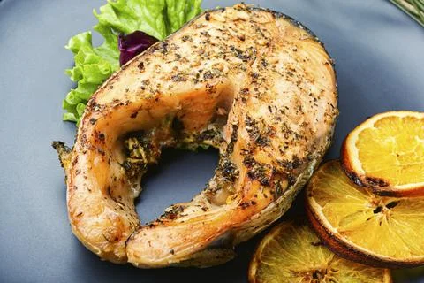 Salmon roasted in orange Stock Photos