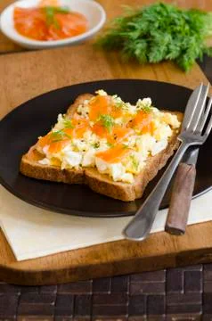 Salmon with scrambled egg Stock Photos