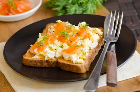 Salmon with scrambled egg Stock Photos