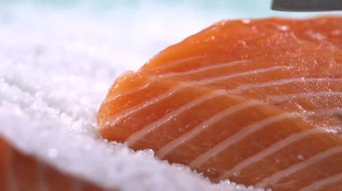 Salmon slicing in slow motion Stockbeeldmateriaal 49031957