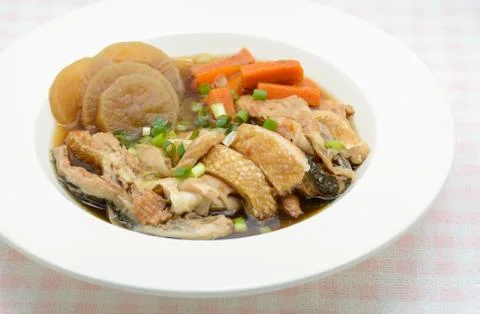 Salmon in soy source with vegetables, fish maw soup Stock Photos