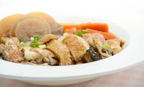 Salmon in soy source with vegetables, fish maw soup Stock Photos