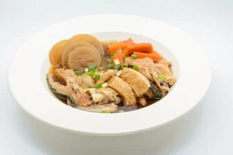 Salmon in soy source with vegetables, fish maw soup Stock Photos