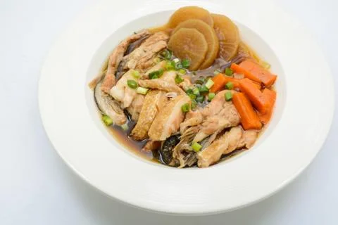 Salmon in soy source with vegetables, fish maw soup Stock Photos