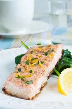 Salmon with spinach Stock Photos