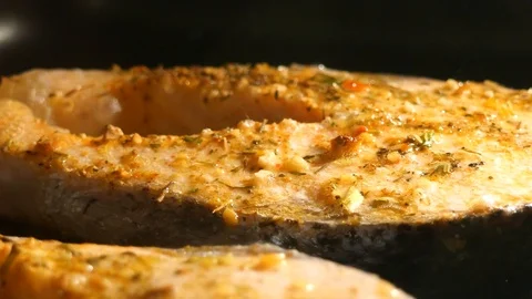 Salmon steak is cooked in the oven. Stock Footage 116614049