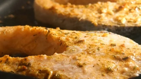 Salmon steak is cooked in the oven. Stock Footage 116614199