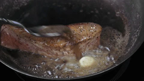 Salmon steak fried in butter Stock Footage 170786845