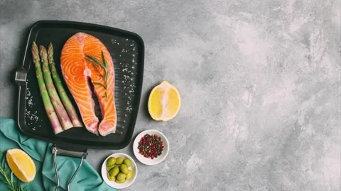 Salmon steak on grill pan with the addition of rosemary, aromatic spices Stock Footage 130500242