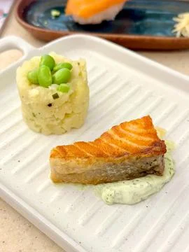 Salmon steak with mashed potatoes Stock Photos