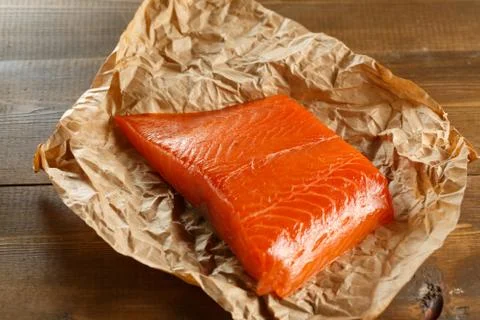 Salmon steak on old papper. Foto stock