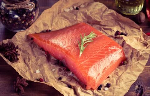 Salmon steak on old papper. Stock Photos