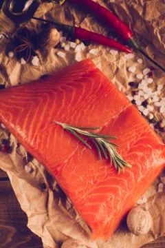 Salmon steak on old papper. Stock Photos