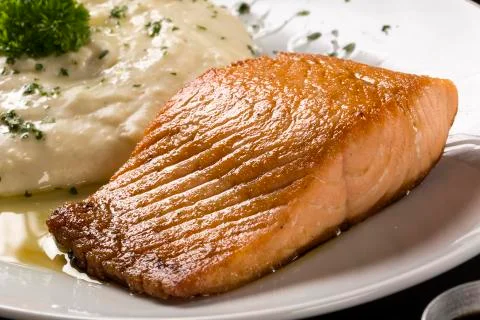Salmon steak with risotto rice Foto stock