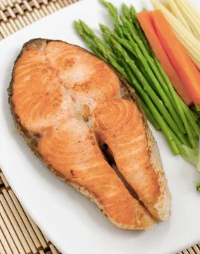 Salmon Steak with vegetable Stock Photos