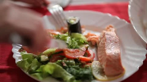 Salmon steak with vegetables. Stock Footage 22239216