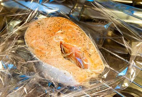 Salmon in the transparent package Stock Photos