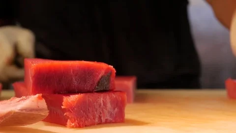 Salomon cuting sushi cheef, raw ahi for sushi Stock-Footage 80426582