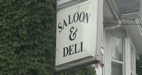 Saloon &amp; Deli Sign Stock Footage 76920785