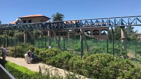 Salou, Spain, A bridge with a building in the background Stock Footage 134079622