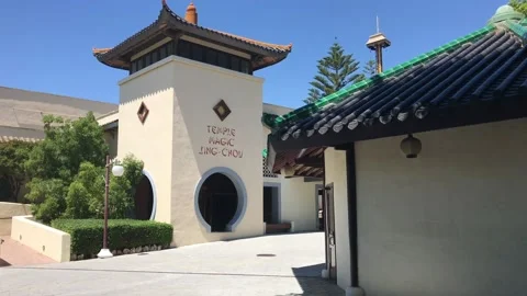 Salou, Spain, A small clock tower in front of a building 스톡 동영상 134068386