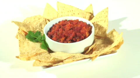 Salsa and chips high angle loop - HD  Stock Footage 369858