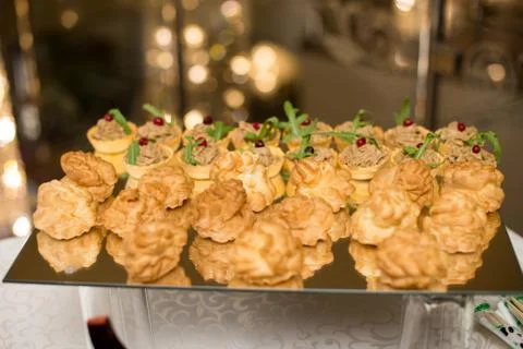 Salsa canape cracker appetizers with soft cheese. Stock Photos