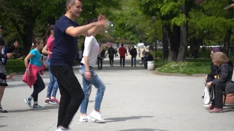 Salsa dance lesson in a park Stock Footage 111348534