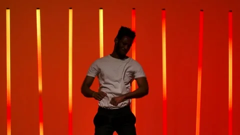 Salsa dance performed by a young black man. A dancer practices Latin dance Stock Footage 146098046