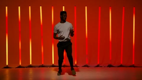 Salsa dance performed by a young black man. A dancer practices Latin dance Stock Footage 146101620