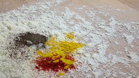 Salt is added to different pepper and flour. Slow motion Stock Footage 75488094