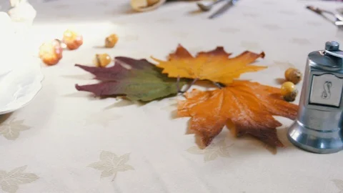 Salt and pepper grinder on table with thankgiving spread Stock Footage 117946921