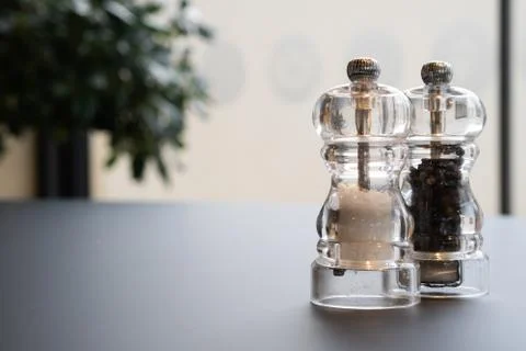 Salt and Pepper Shaker on the table Stock Photos