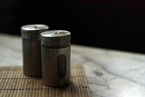 Salt and pepper on a table Foto stock