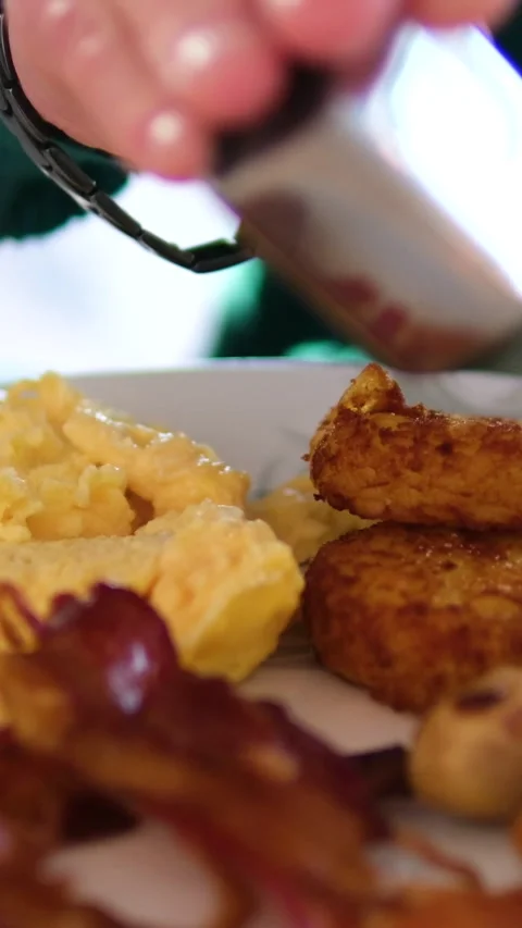 Salt the bacon omelette Turkish scrambled eggs with roasted meat in copper pan Video stock 323926856