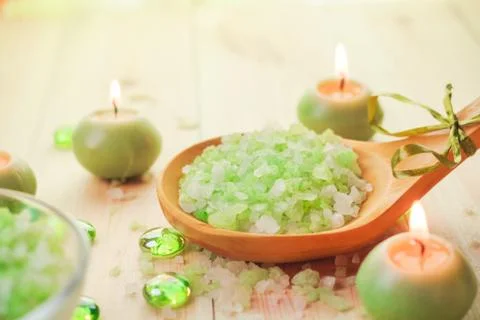 Salt bath scented candles table Stock Photos