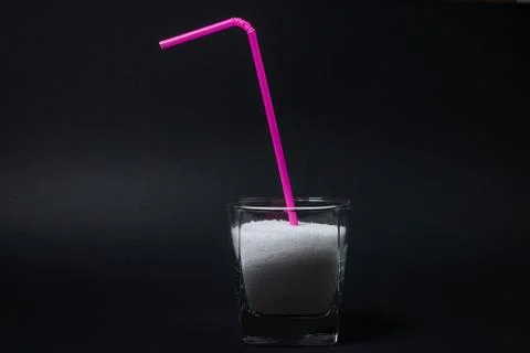 Salt on a black background. Stock Photos