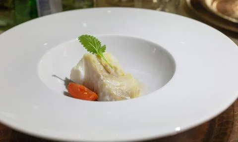 Salt cod in frying Stock Photos