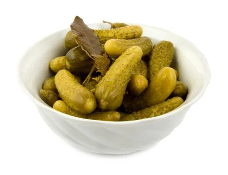 Salt cucumbers in a dish Stock Photos