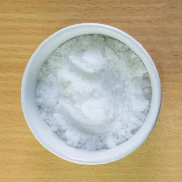Salt in cup  Stock Photos