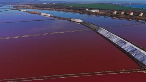 Salt fields seen from above during a sunny day in the countryside Stock Footage 328528355