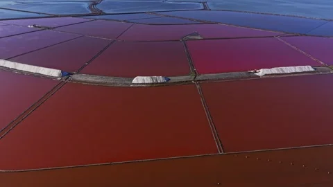 Salt fields show various stages of harvesting in a coastal area Stock Footage 328527362